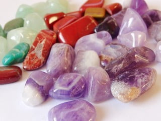 A romantic bedroom setup with flowers and candles - FENG SHUI FOR LOVE