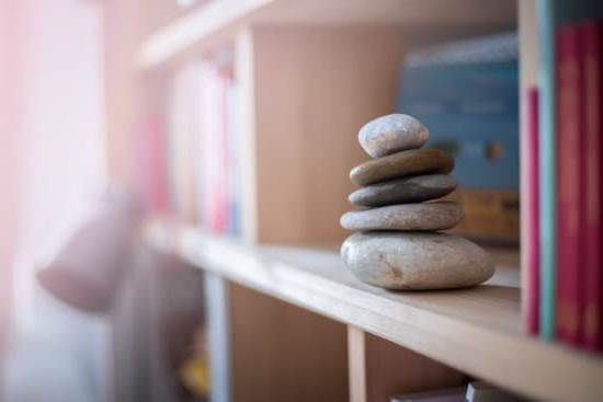 Feng Shui for Attracting Love A heart-shaped crystal placed in the southwest corner of a bedroom, enhancing feng shui for attracting love
