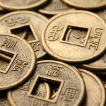 Enhance bedroom Feng Shui with calming colors, plants, and balanced furniture arrangements for positive energy flow